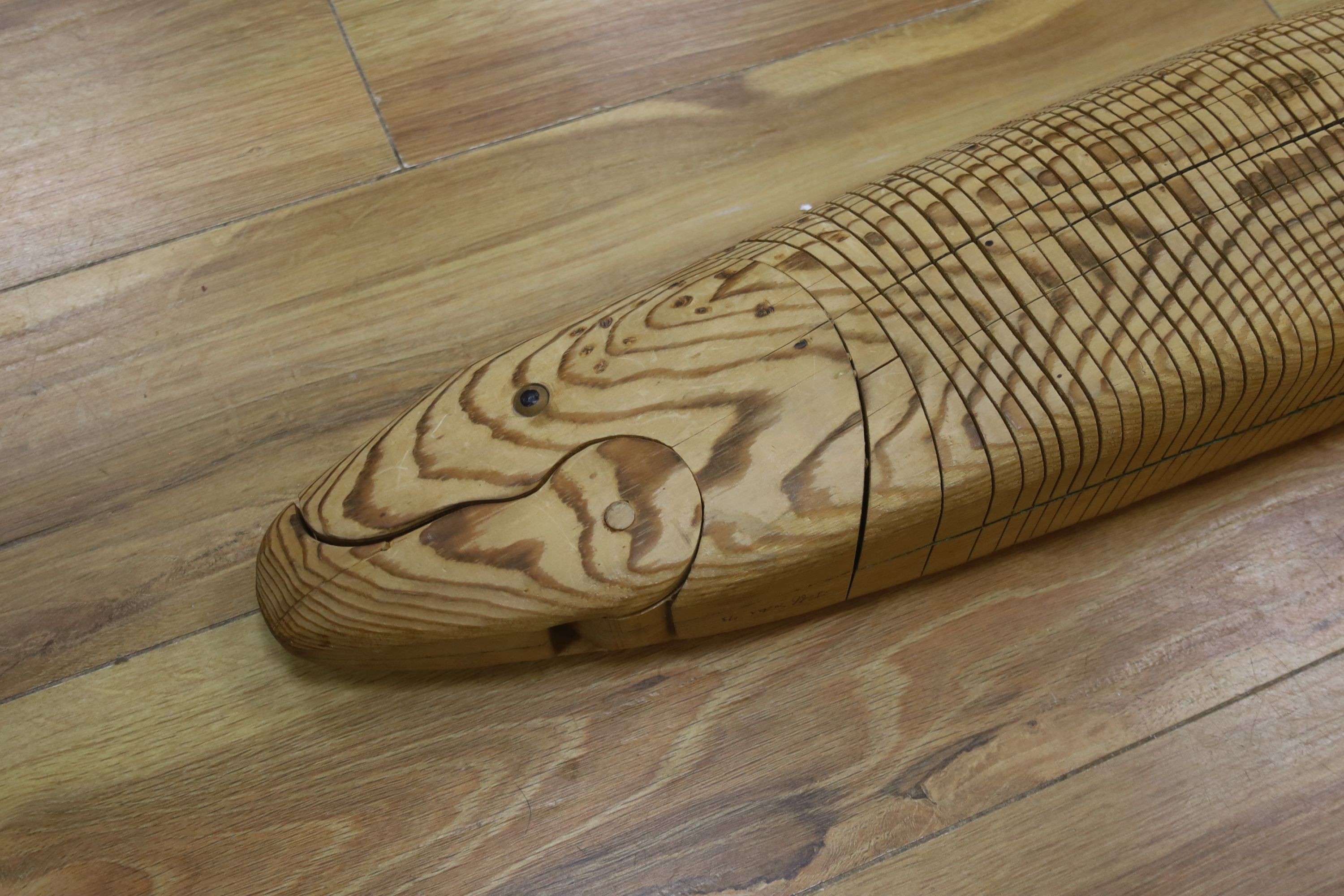 A large articulated pine model of a pike, 98cm